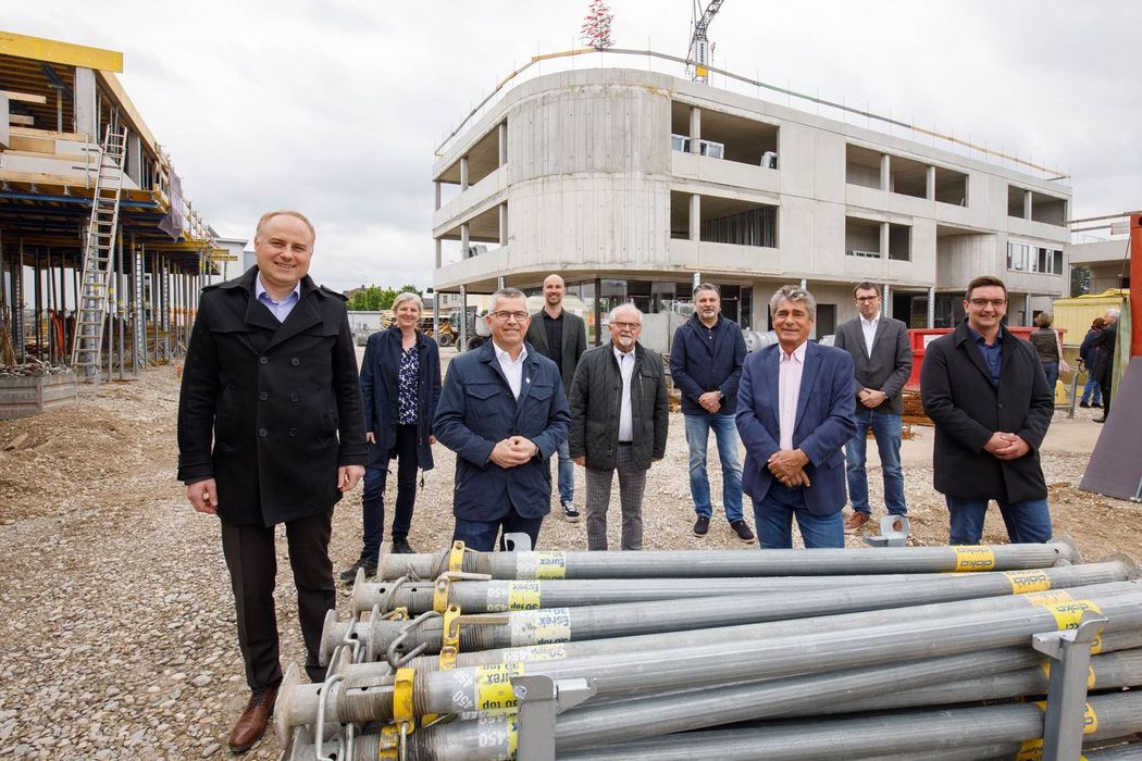 topping_out_ceremony_at_weidfeld_building_coming_home_dionysius_neighborhood_center_weidfeld